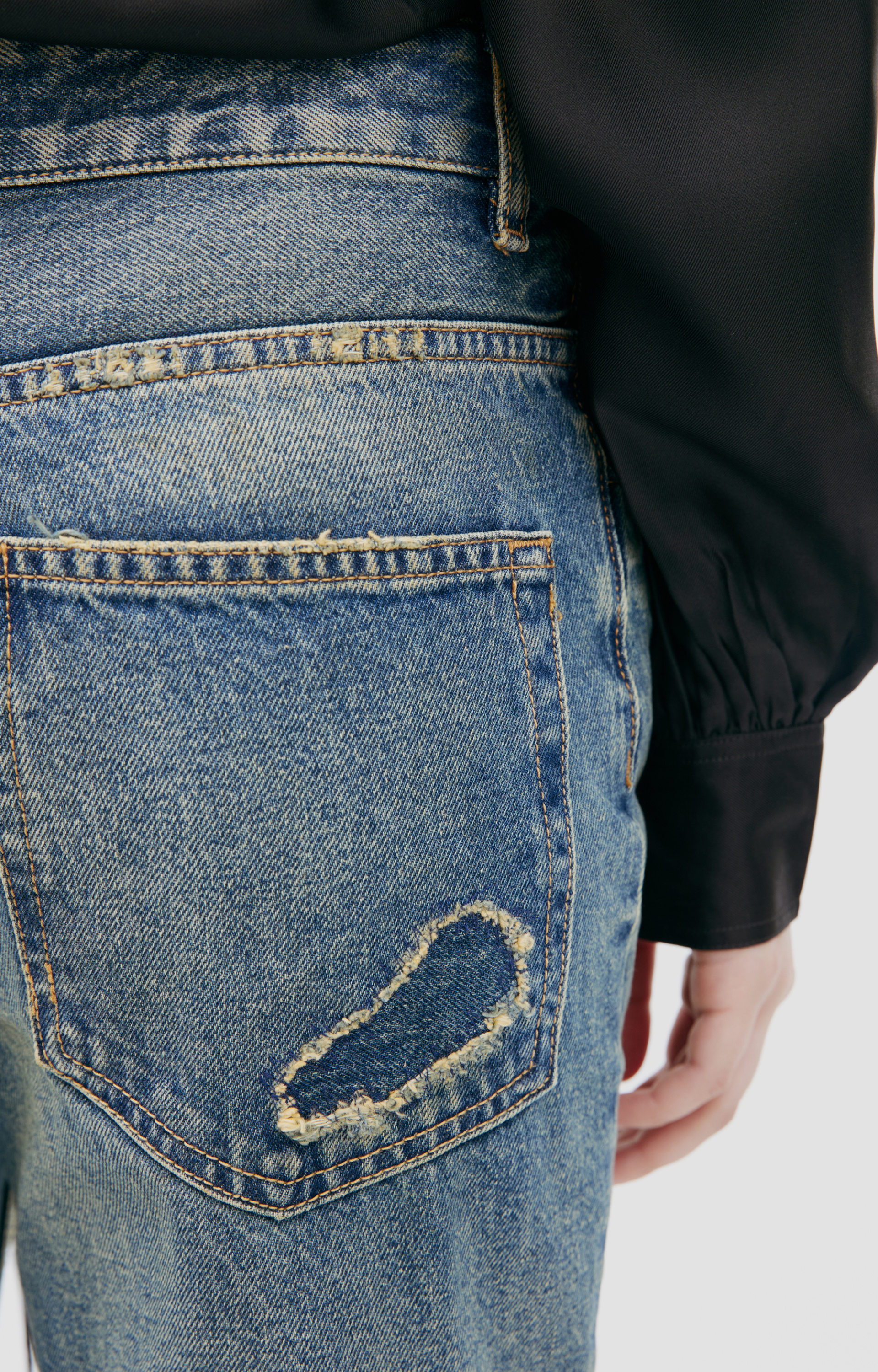 Ann Demeulemeester Расклешенные джинсы с потертостями